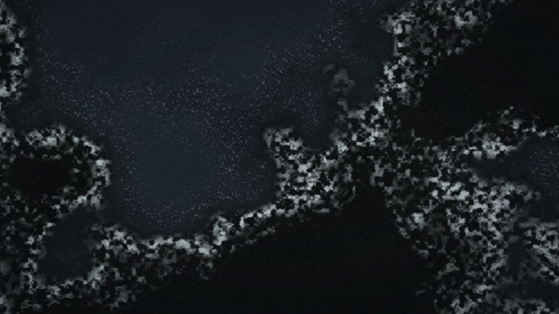 Surf on black sand, from above